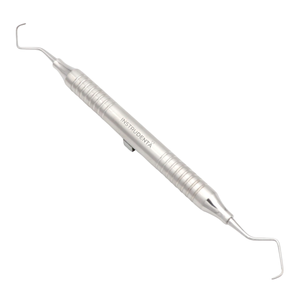 close view of curettes showing extended blade design for deep access scaling.